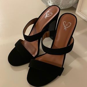 Black heels. Only worn once.